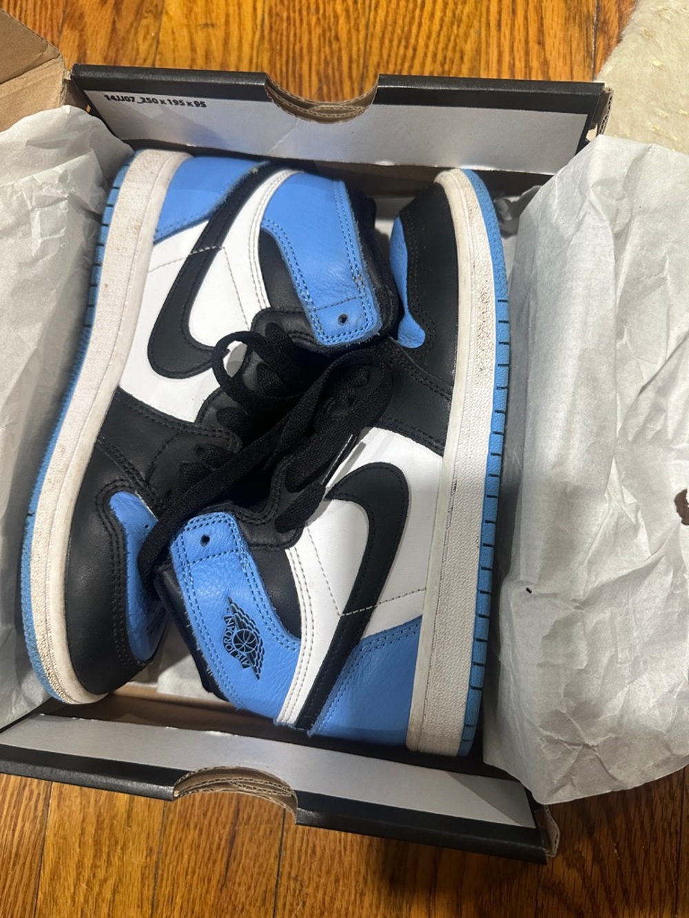 Air Jordan 1 Mid-Style High Top Sneakers in University Blue/Black/White